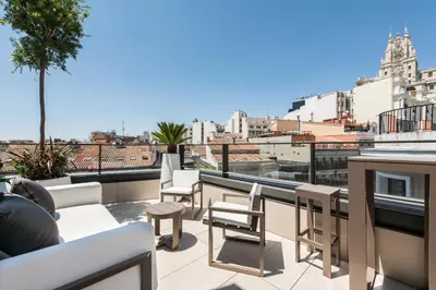 Un balcón o terraza de The Garden Suites