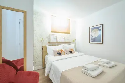 Cama o camas de una habitación en Your BEST EXPERIENCE old Madrid CHUECA