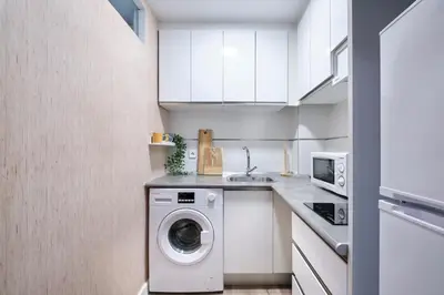 Una cocina o zona de cocina en Your BEST EXPERIENCE old Madrid CHUECA