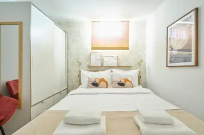 Cama o camas de una habitación en Your BEST EXPERIENCE old Madrid CHUECA