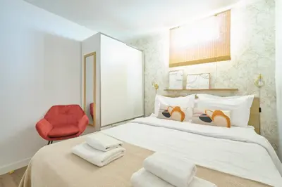 Cama o camas de una habitación en Your BEST EXPERIENCE old Madrid CHUECA