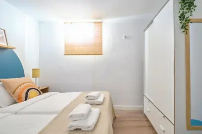 Cama o camas de una habitación en Your BEST EXPERIENCE old Madrid CHUECA