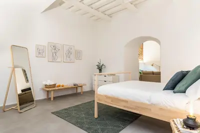 Cama o camas de una habitación en Waou Chueca IV - Alquiler Corta Duración