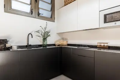 Una cocina o zona de cocina en Waou Chueca IV - Alquiler Corta Duración