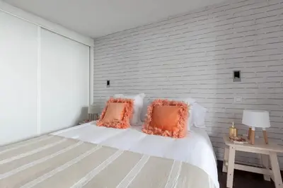 Cama o camas de una habitación en Charming Apartment Madrid 57 m² + Internet