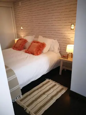 Cama o camas de una habitación en Charming Apartment Madrid 57 m² + Internet