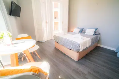 Cama o camas de una habitación en Apartments Madrid Plaza Mayor-Tintoreros