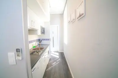 Una cocina o zona de cocina en Apartments Madrid Plaza Mayor-Tintoreros