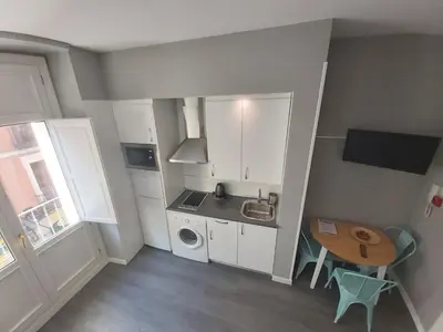 Una cocina o zona de cocina en Apartments Madrid Plaza Mayor-Cava baja