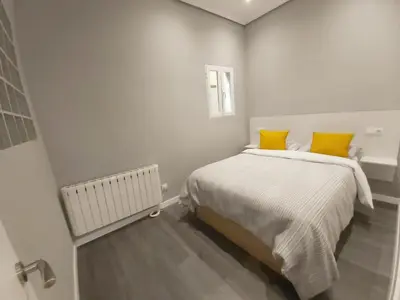Cama o camas de una habitación en Apartments Madrid Plaza Mayor-Cava baja