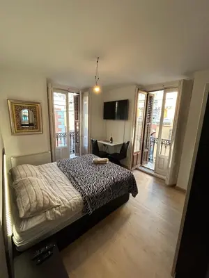 Cama o camas de una habitación en Room in Plaza Mayor