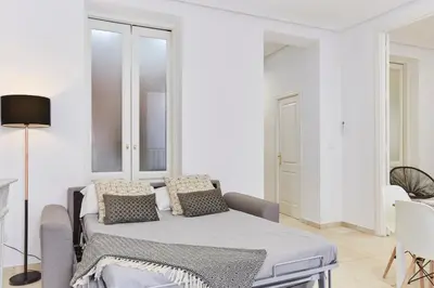 Cama o camas de una habitación en LEEWAYS APARTMENT VI in GRAN VÍA