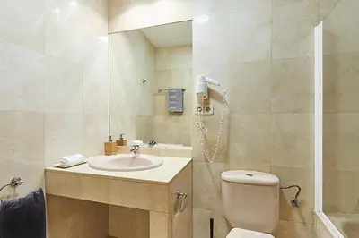 Un baño de LEEWAYS APARTMENT VI in GRAN VÍA