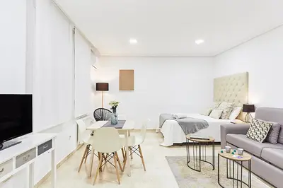 Una televisión o centro de entretenimiento en LEEWAYS LOFT XXXI in GRAN VÍA