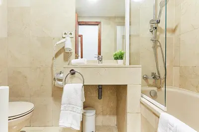 Un baño de LEEWAYS APARTMENT III in GRAN VÍA