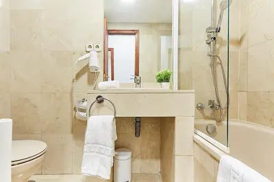 Un baño de LEEWAYS APARTMENT III in GRAN VÍA