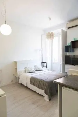 Cama o camas de una habitación en Un Fascinante Estudio En Madrid Centro
