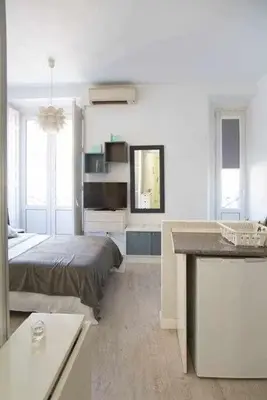 Cama o camas de una habitación en Un Fascinante Estudio En Madrid Centro