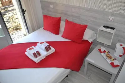 Cama o camas de una habitación en Hostal Madrid Sol