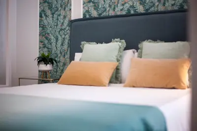 Cama o camas de una habitación en Gran Vía Fomento Apartment