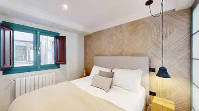 Cama o camas de una habitación en Sol y El Madroño