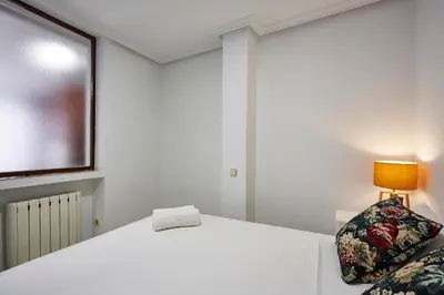 Cama o camas de una habitación en LEEWAYS APARTMENT I in GRAN VÍA