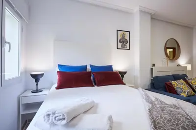 Cama o camas de una habitación en LEEWAYS APARTMENT XXII in GRAN VÍA