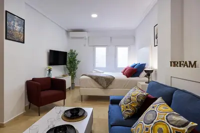 Cama o camas de una habitación en LEEWAYS APARTMENT XXII in GRAN VÍA
