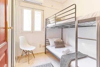 Cama o camas de una habitación en LEEWAYS APARTMENT XXIX in GRAN VÍA