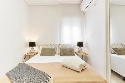 Cama o camas de una habitación en LEEWAYS APARTMENT XXIX in GRAN VÍA