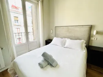 Cama o camas de una habitación en dPLACE To Be - Luxury Apartment in Historic Center