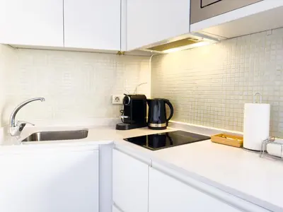 Una cocina o zona de cocina en Inmejorable Ubicación en Madrid