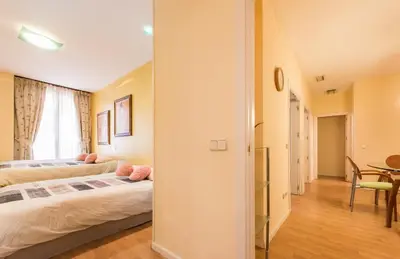 Cama o camas de una habitación en M&F FUENCARRAL