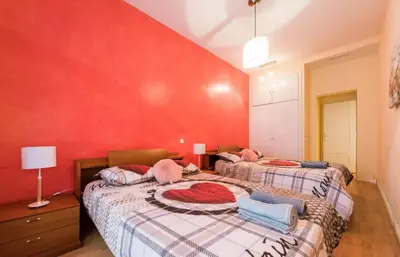 Cama o camas de una habitación en M&F FUENCARRAL