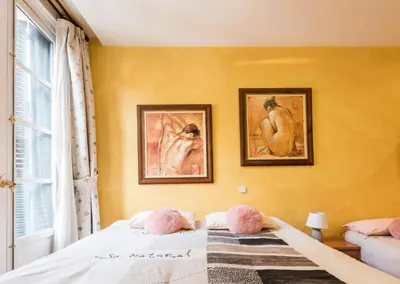 Cama o camas de una habitación en M&F FUENCARRAL