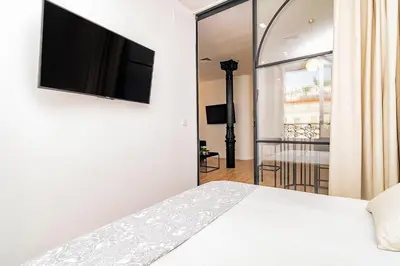 Cama o camas de una habitación en Unbeatable views of Puerta del Sol by Batuecas
