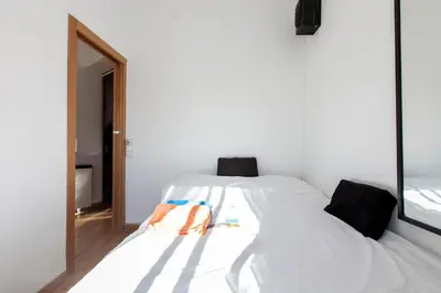 Cama o camas de una habitación en Charming Apartment Madrid 50m² +AC