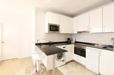 Una cocina o zona de cocina en Urbantec Realty - Plaza de Colón