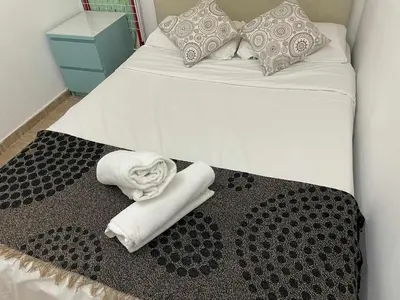 Cama o camas de una habitación en A unos Pasos de Sol-Gran vía Madrid