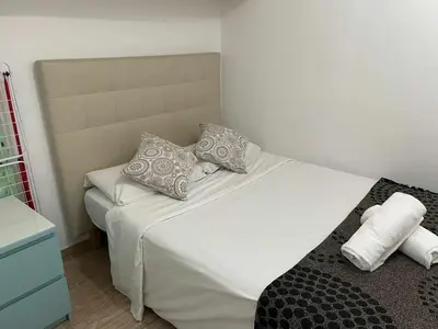 Cama o camas de una habitación en A unos Pasos de Sol-Gran vía Madrid
