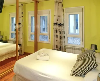 Cama o camas de una habitación en Cosy apartment in the heart of Madrid, 45m², with A/C