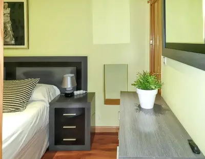 Cama o camas de una habitación en Cosy apartment in the heart of Madrid, 45m², with A/C