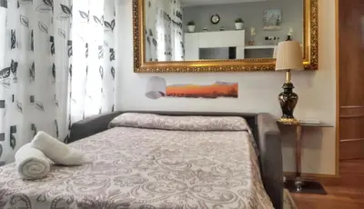 Cama o camas de una habitación en Cosy apartment in the heart of Madrid, 45m², with A/C