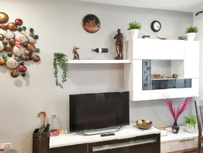 Una televisión o centro de entretenimiento en Cosy apartment in the heart of Madrid, 45m², with A/C