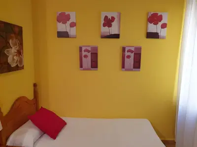 Cama o camas de una habitación en Apartamentos Dana Madrid