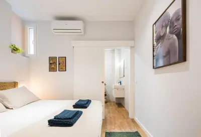 Cama o camas de una habitación en NEW DESIGN APARTMENT BARRIO DE LAS LETRAS