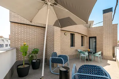Un balcón o terraza de Color Apartments by Olala Homes