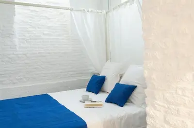 Cama o camas de una habitación en Cosy Apartment in the heart of Barrio de las Letras