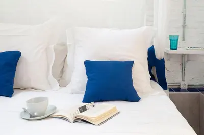 Cama o camas de una habitación en Cosy Apartment in the heart of Barrio de las Letras