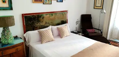 Cama o camas de una habitación en Homelike Chueca